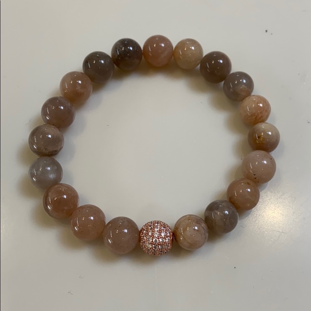 Stone stone with cubic zirconia charm